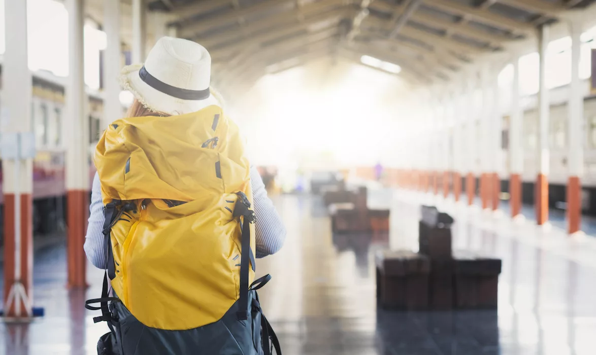 traveller at a train station